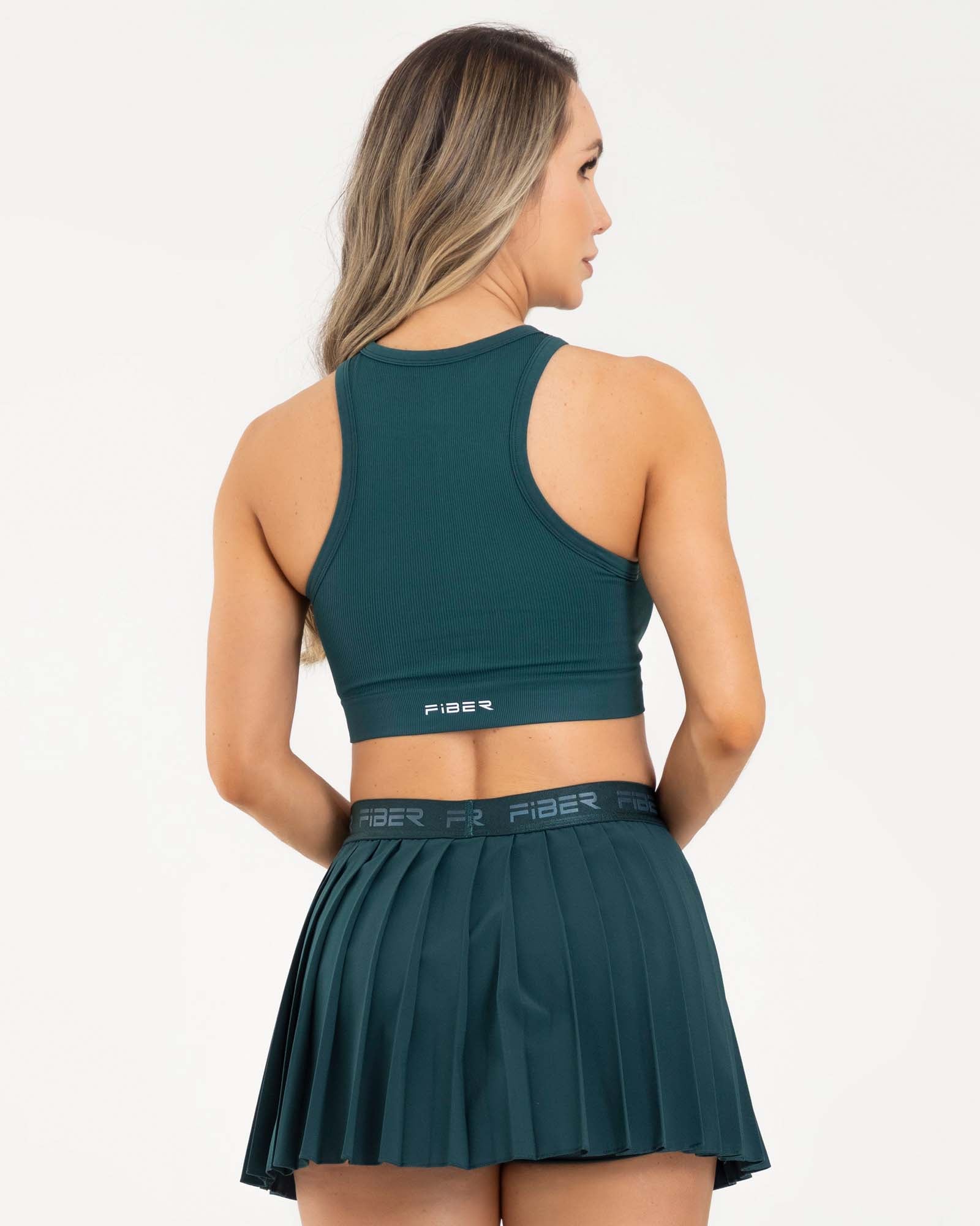 Falda plisada branded verde esmeralda eterea FIBER