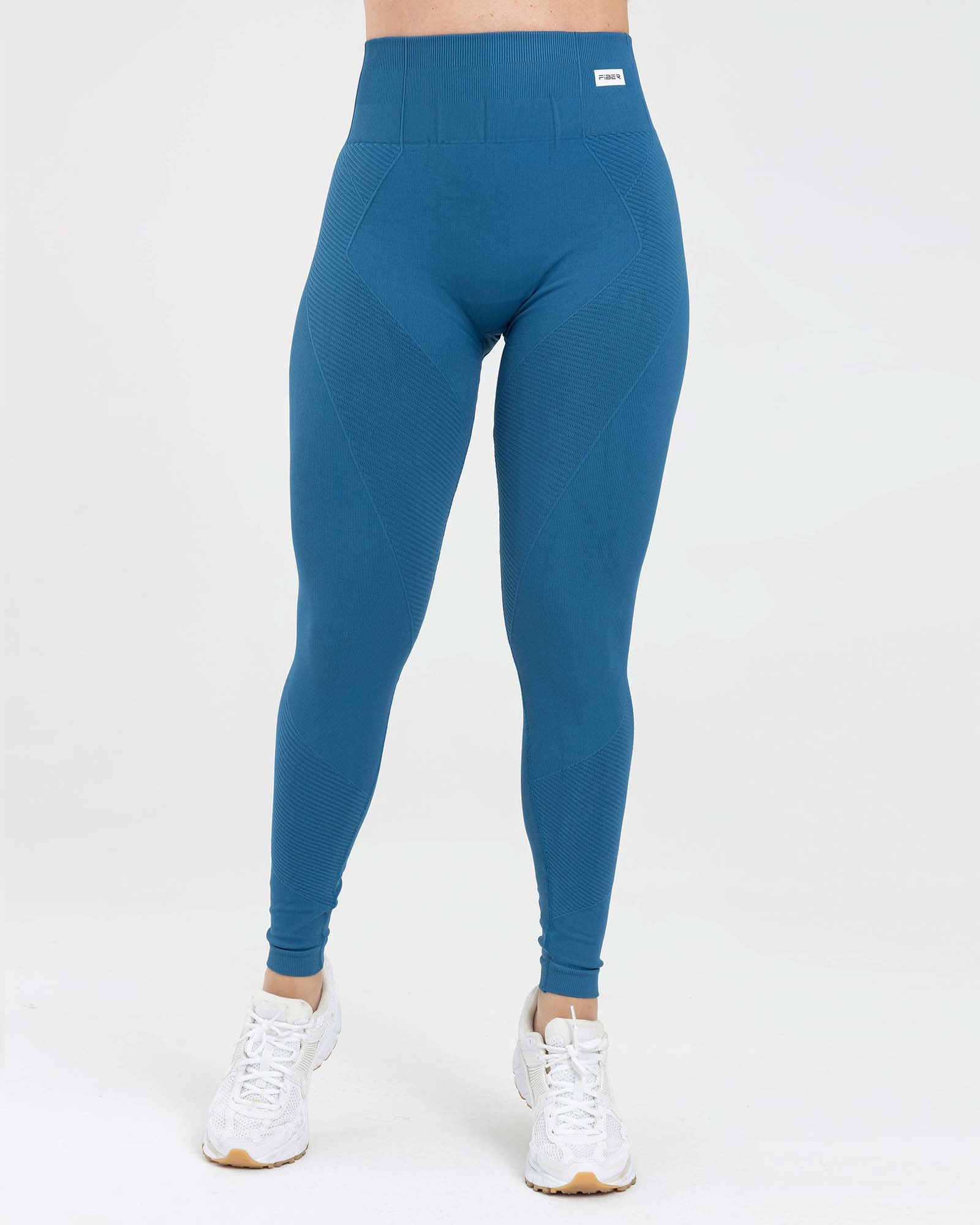 Leggings azul petroleo FIBRA fluir Sin costuras