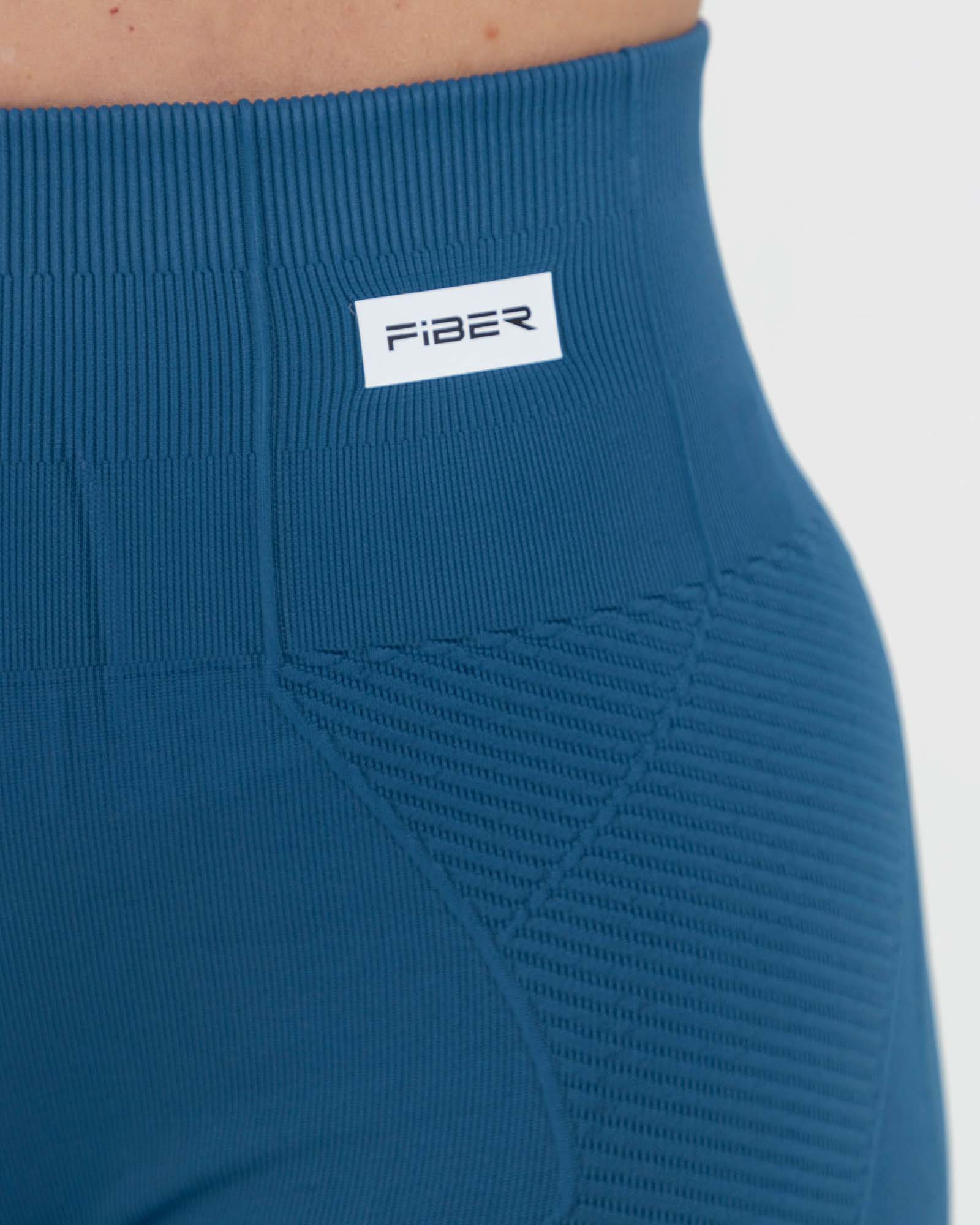 Leggings azul petroleo FIBRA fluir Sin costuras