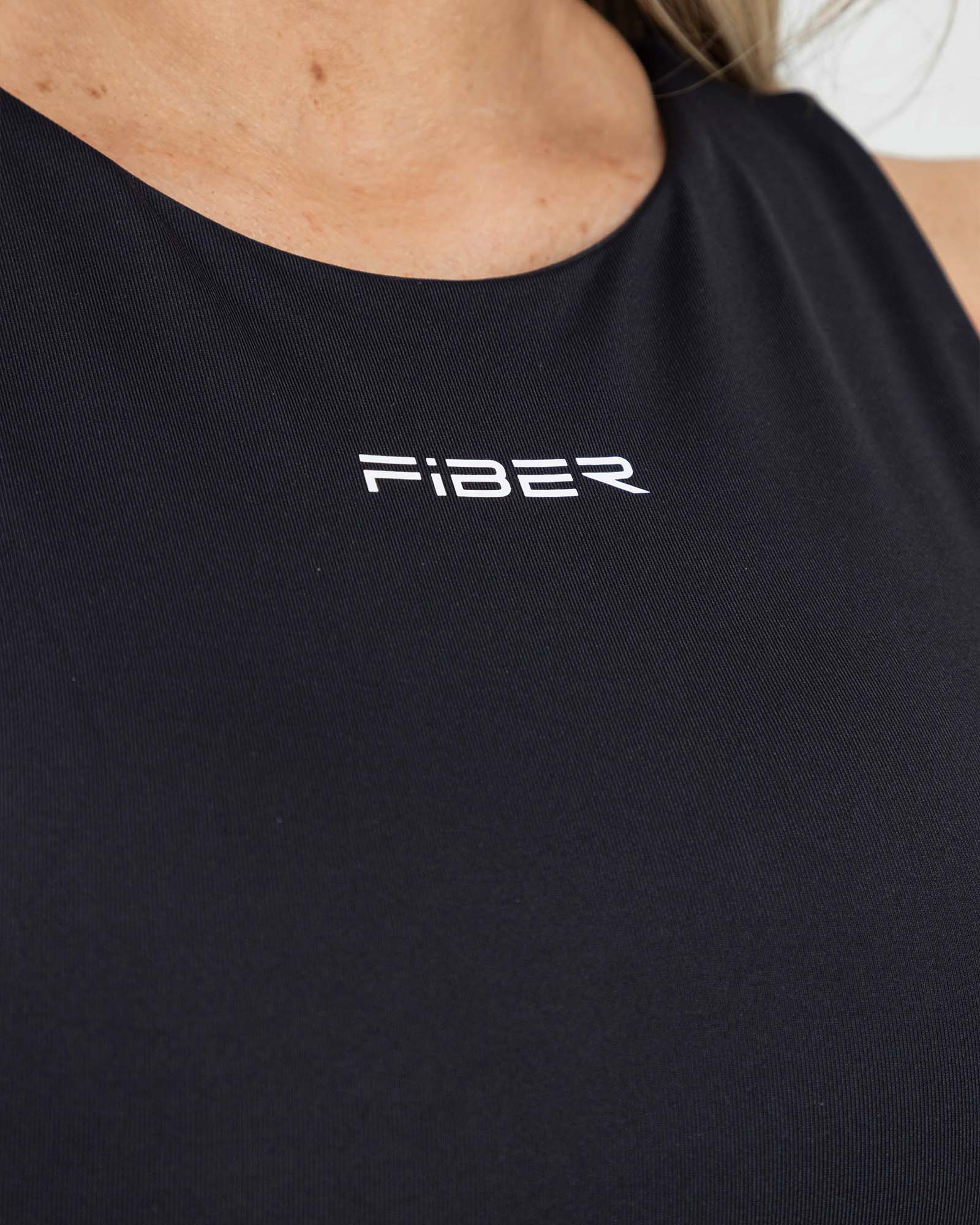 Top sisa negro FIBRA fluir AirRun
