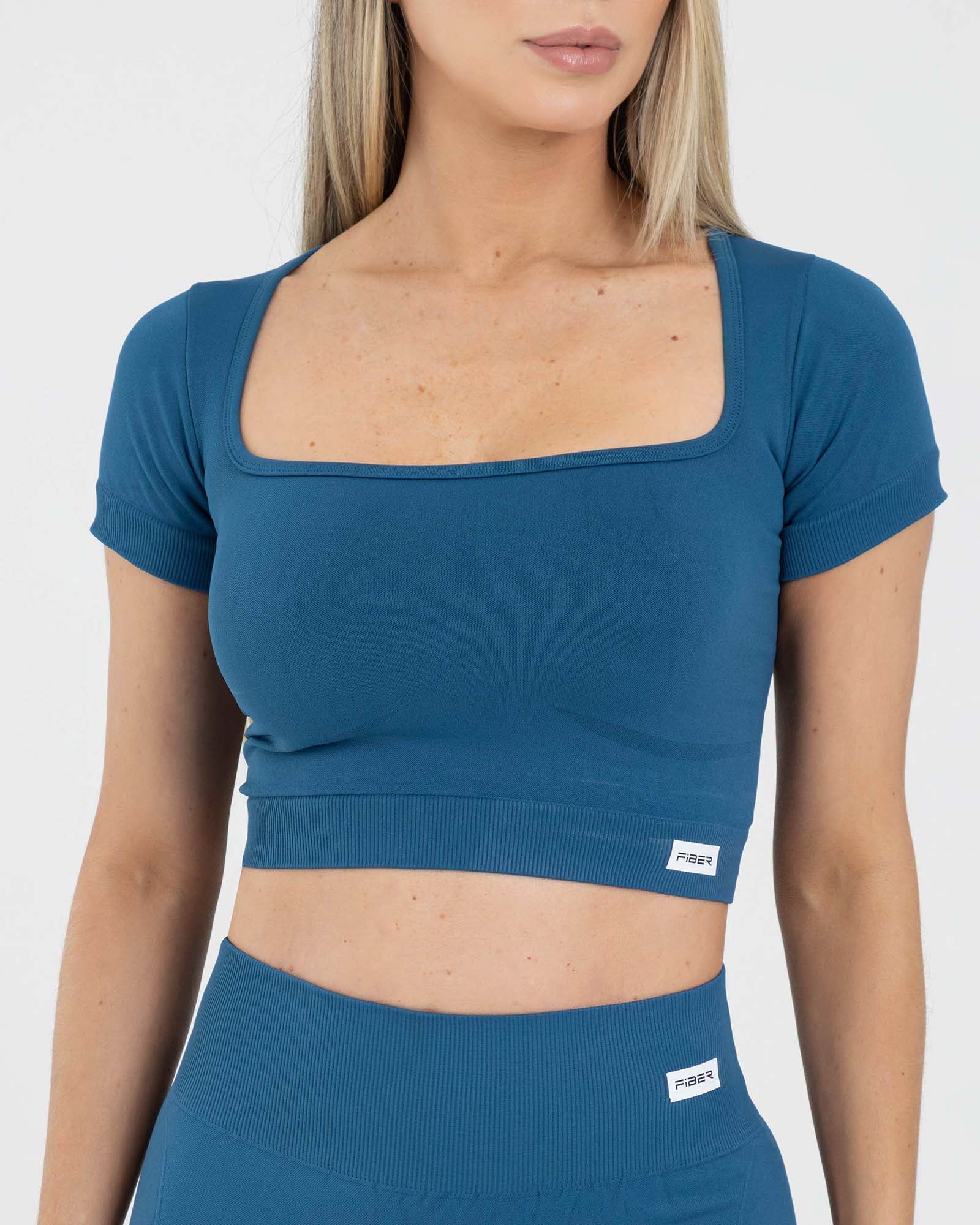 Top manga corta azul petroleo FIBER fluir SeamForm