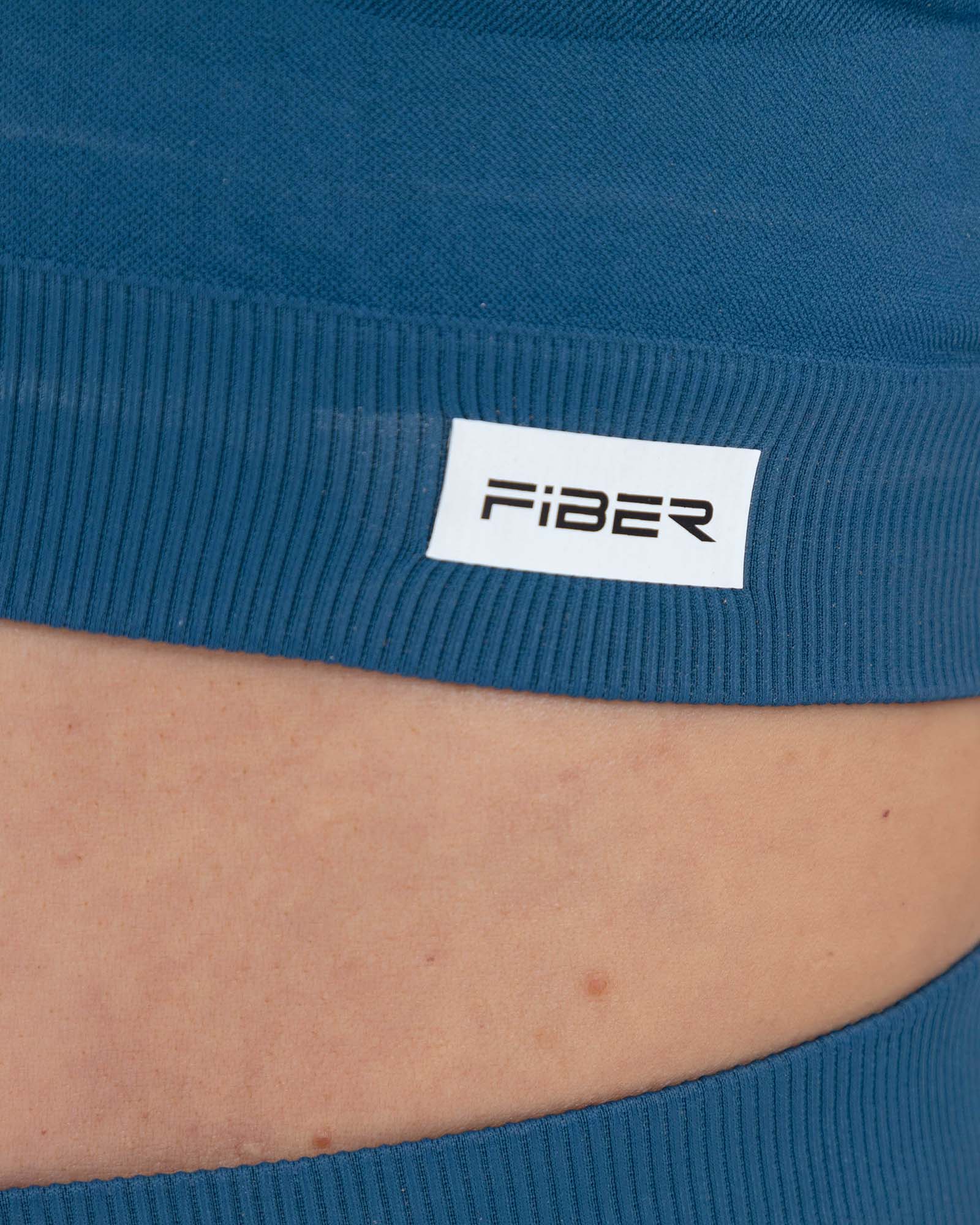 Top manga corta azul petroleo FIBER fluir SeamForm