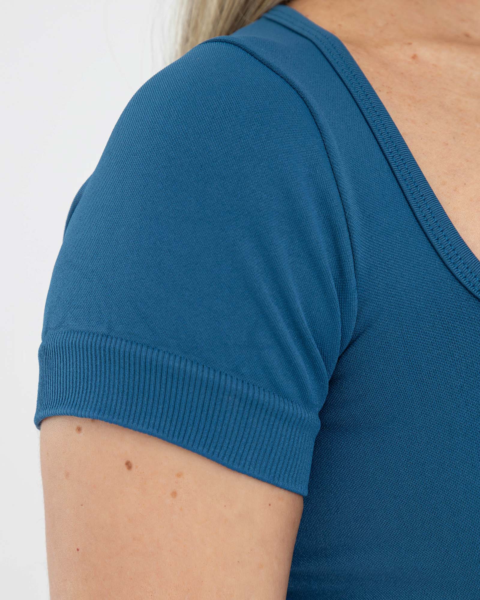 Top manga corta azul petroleo FIBER fluir SeamForm