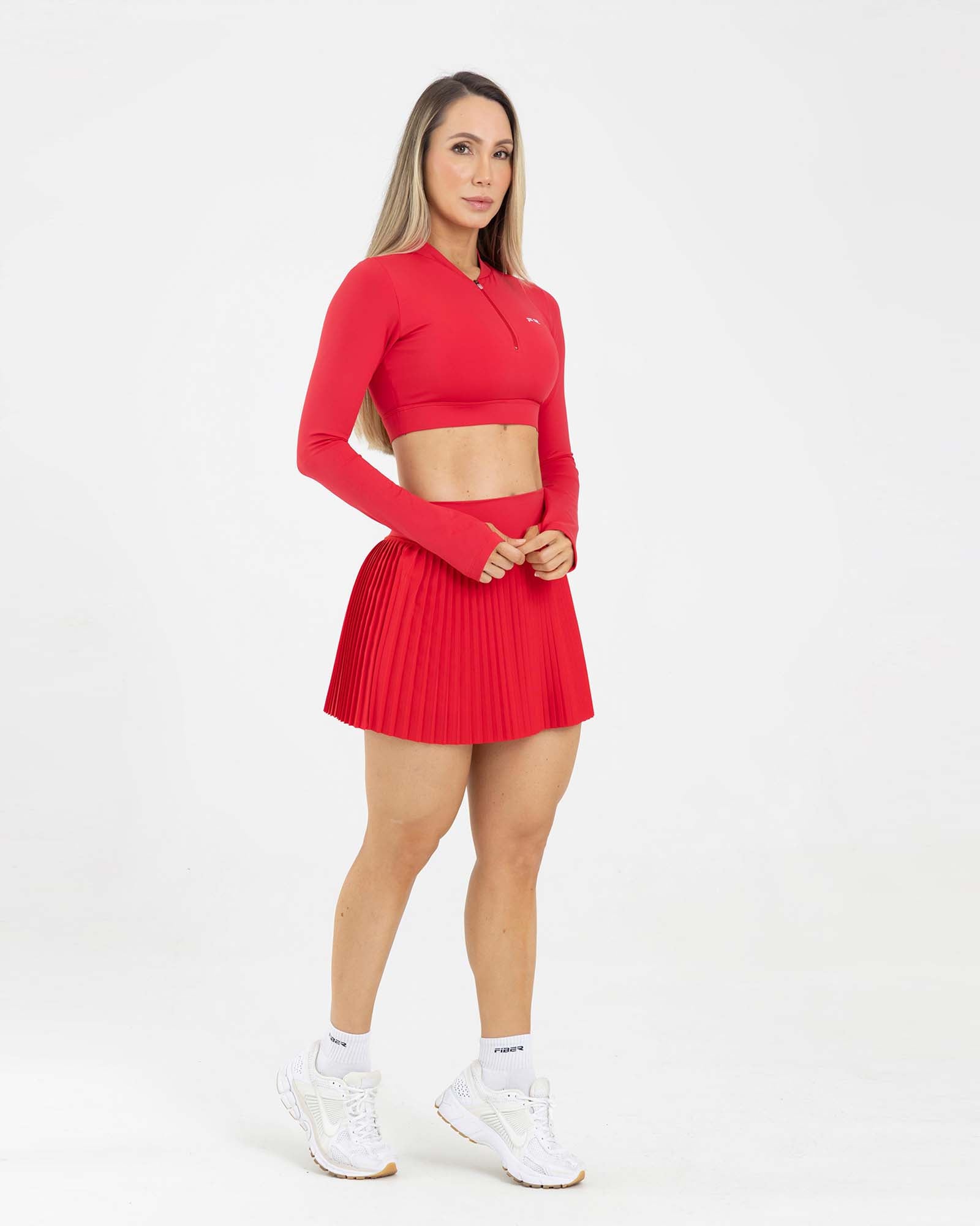 Falda short plisada match rojo scarlet FIBER