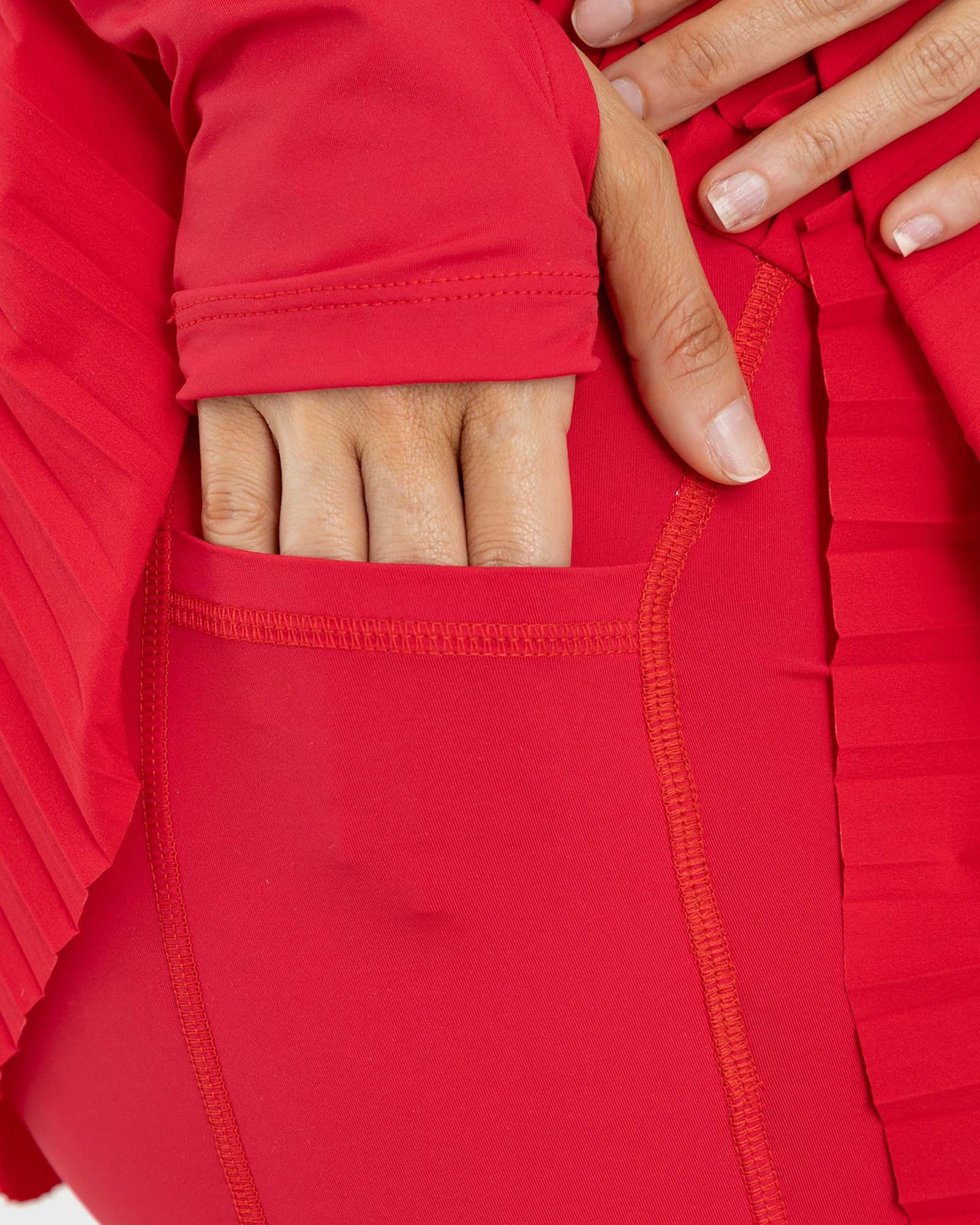 Falda short plisada match rojo scarlet FIBER