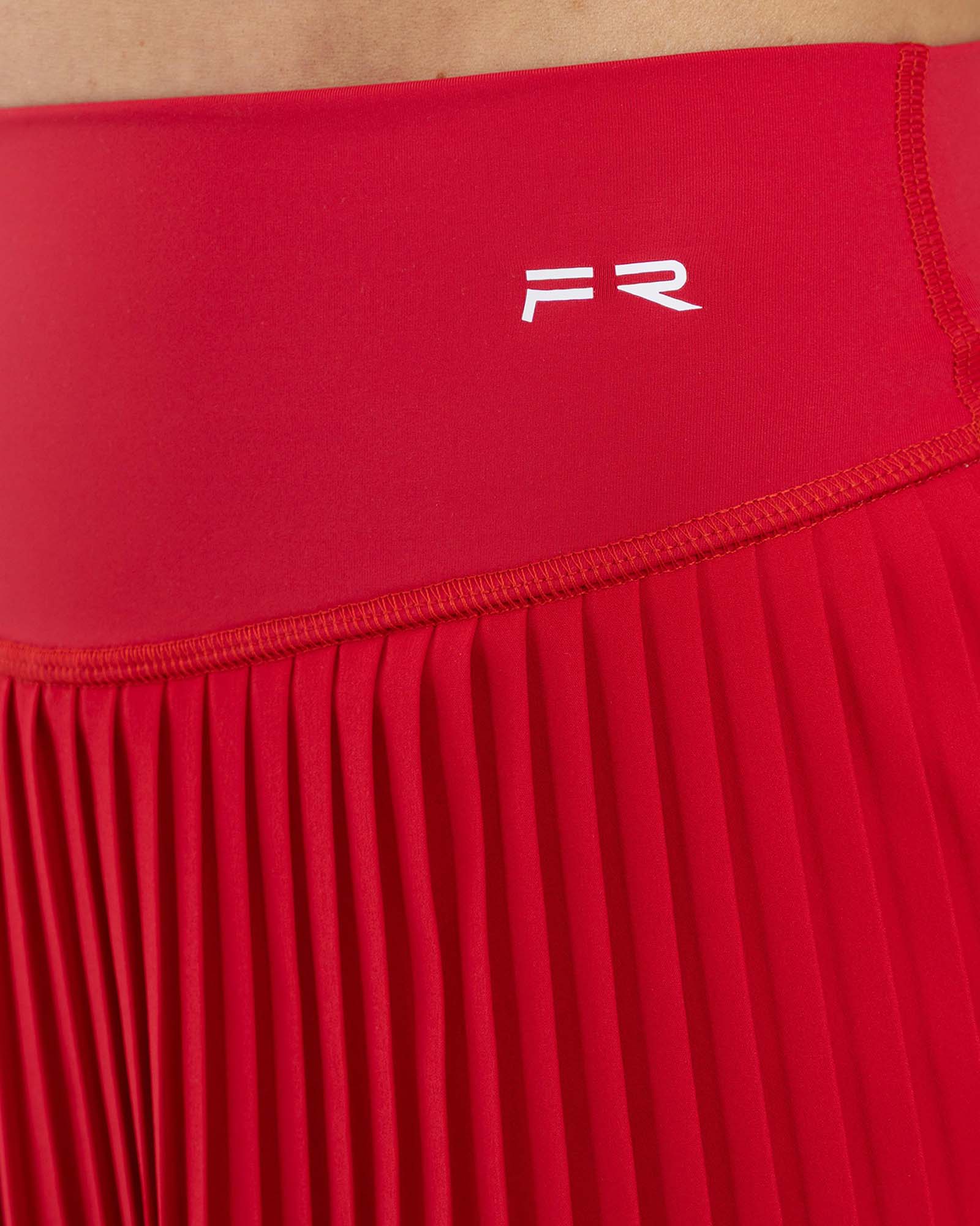 Falda short plisada match rojo scarlet FIBER