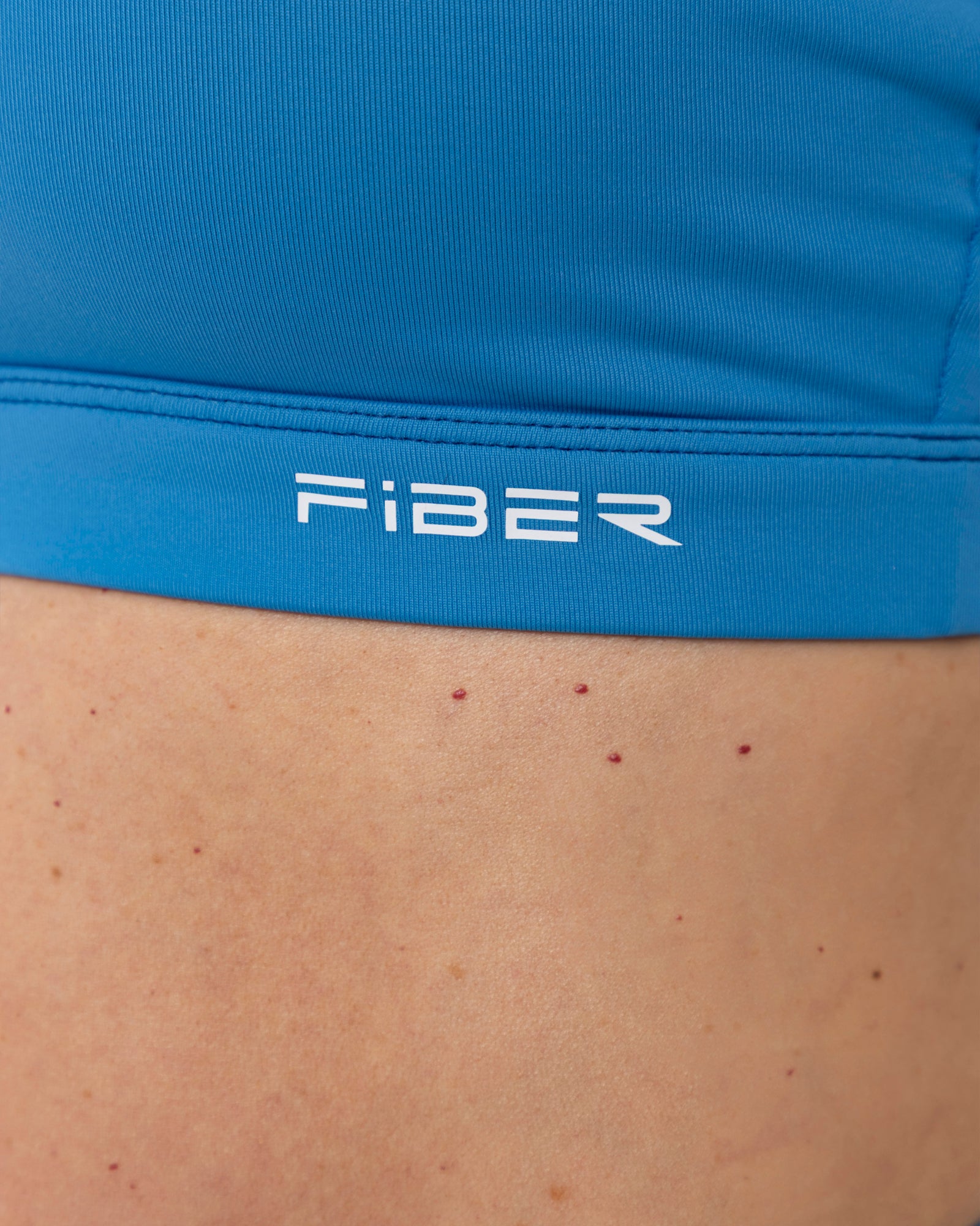 Top sisa motion azul oceano match FIBER