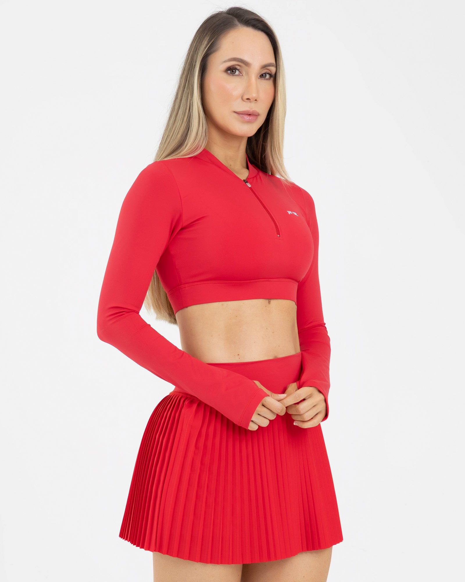 Top manga larga zip rojo scarlet match FIBER