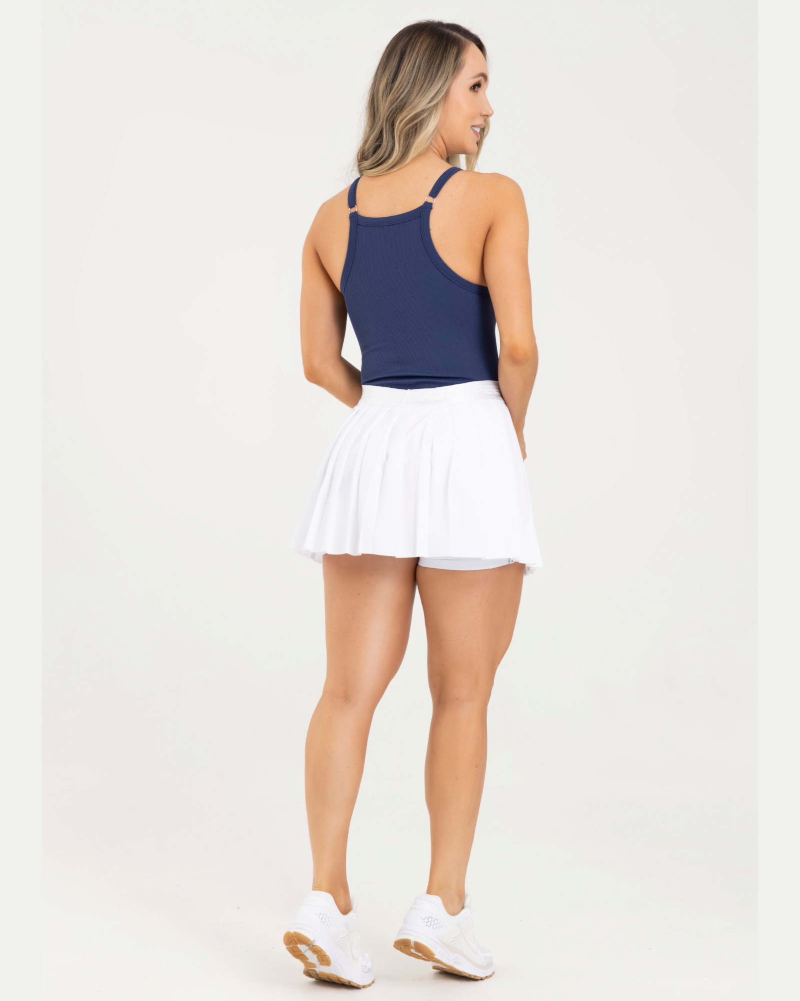 Falda plisada branded blanco eterea FIBER