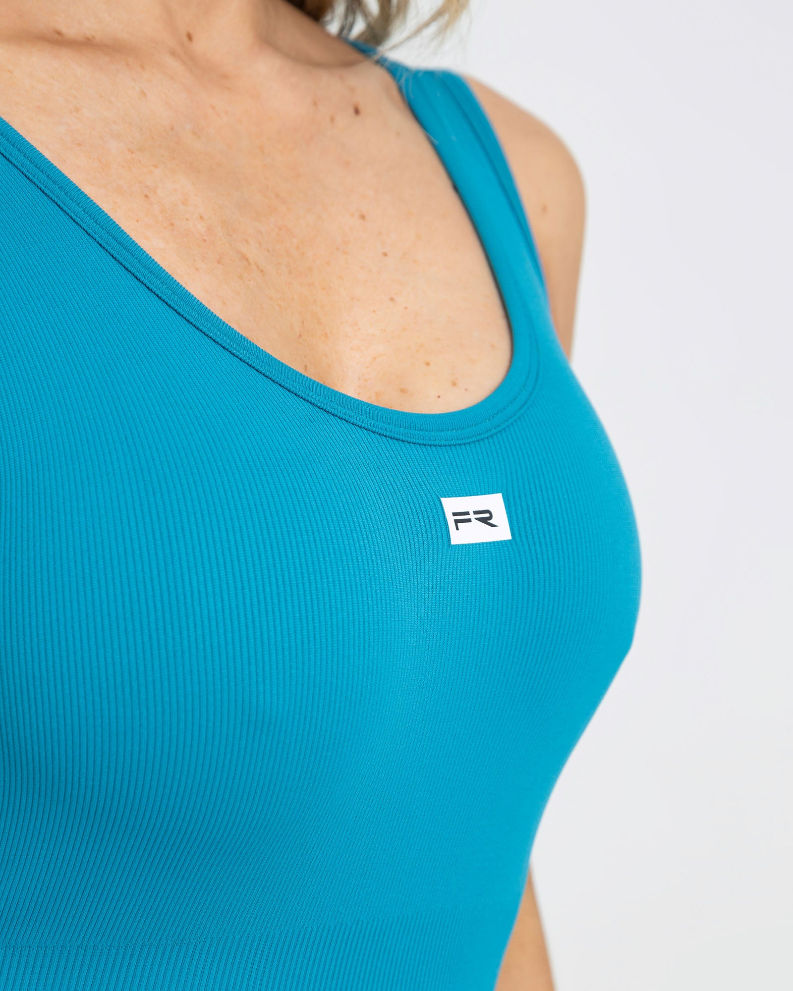 Enterizo corto manga sisa seamless ruching turquesa pilates