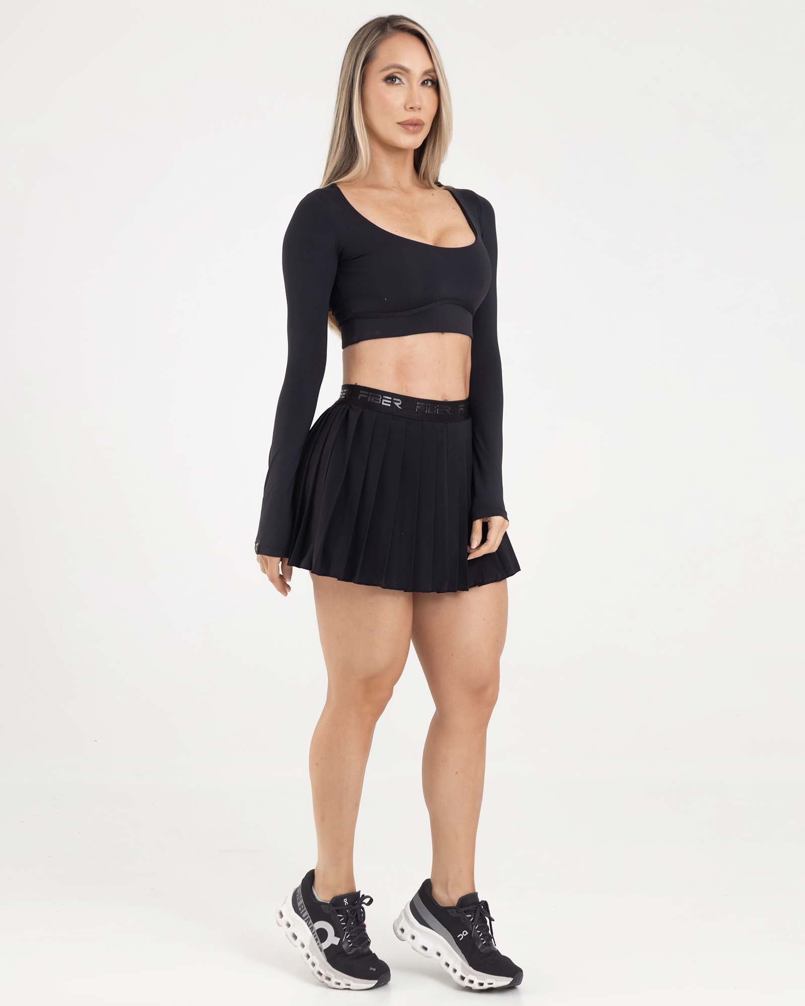 Falda plisada branded negro eterea FIBER