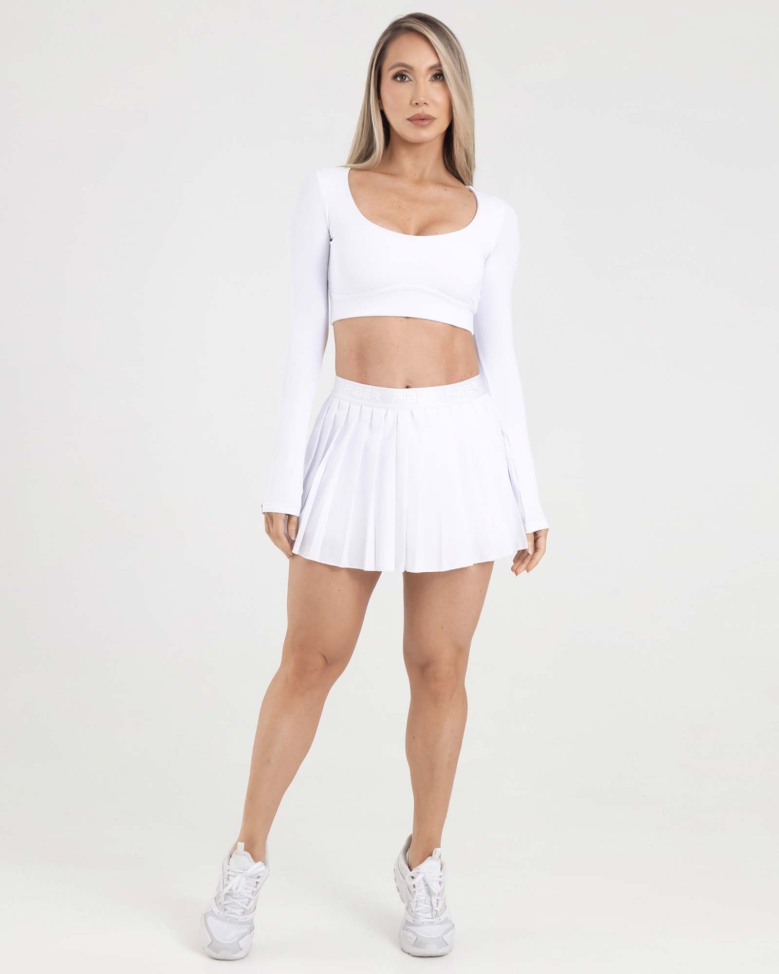 Falda plisada branded blanco eterea FIBER