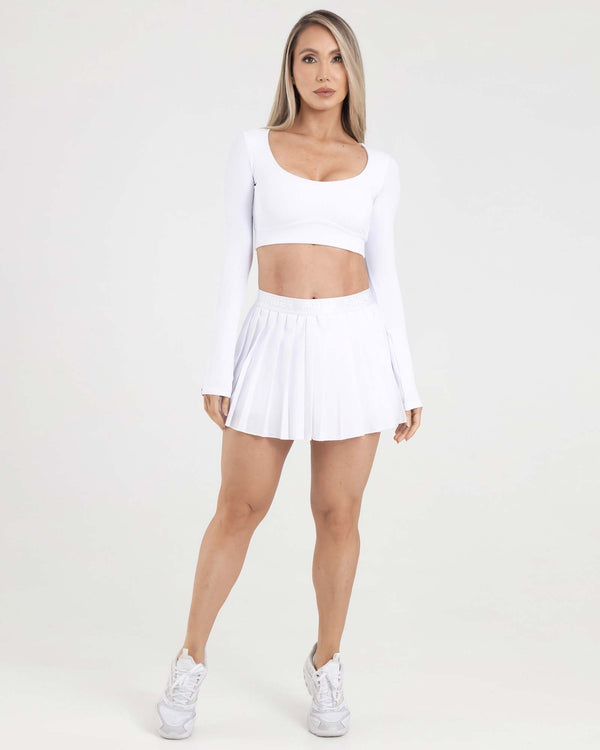 Falda plisada branded blanco eterea FIBER