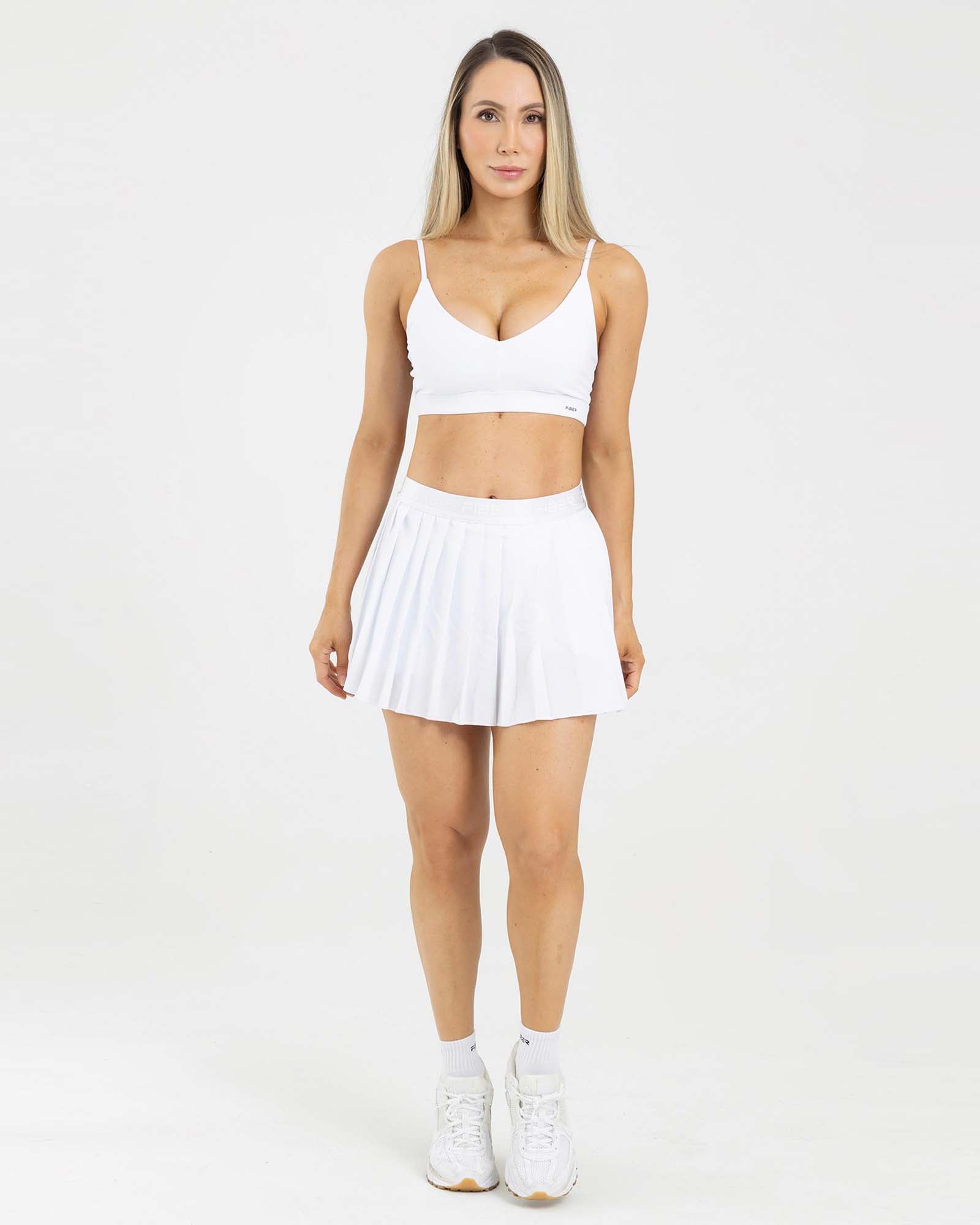 Falda plisada branded blanco eterea FIBER