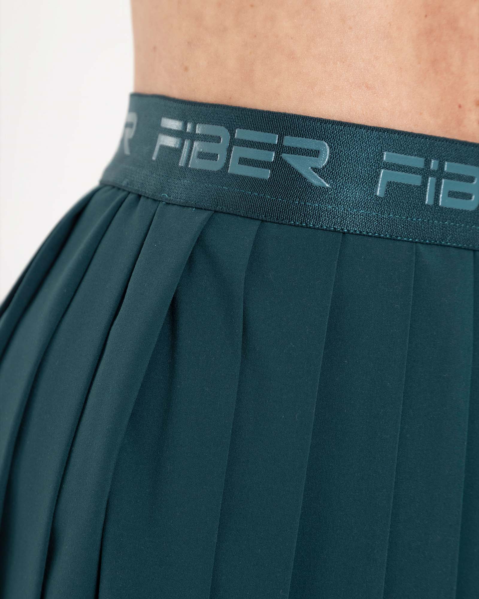 Falda plisada branded verde esmeralda eterea FIBER