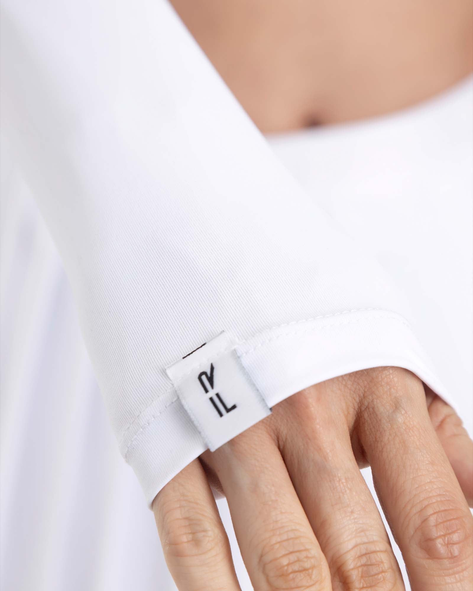 Top manga larga blanco eterea FIBER