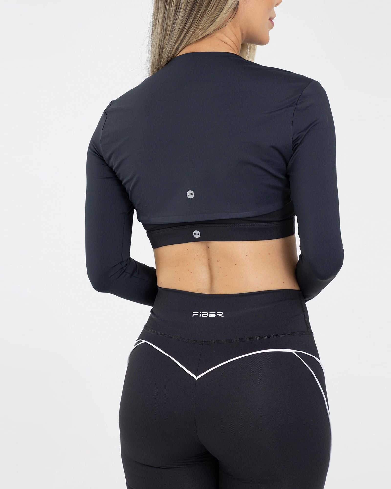 Capa superior complemento negro nivel sube FIBRA